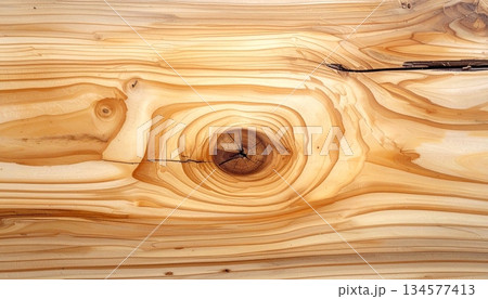 Natural brown oak timber board with a textured grain pattern and old hardwood surface for a decorative wooden plank wall or floor background 134577413