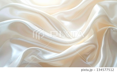 Luxury gold silk satin fabric texture background with smooth shiny waves and elegant soft drapery fashion textile curves 134577512