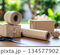 プレゼントの梱包作業　ナチュラルなギフトラッピングイメージ 134577902