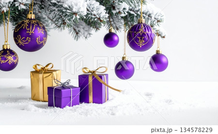 Festive Christmas tree with red and gold ball ornaments and bright gift boxes on a fir branch for a winter holiday celebration Festive Christmas tree with red and gold ball ornaments and bright gift boxes on a fir branch for a winter holiday celebration 134578229