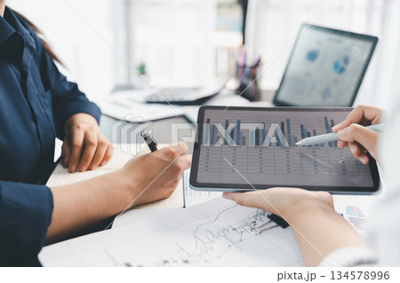 Business meeting, data analytics or women with graph presentation in office. Chart, analysis accounting team brainstorming economy, inflation or solution. business project finance investment concept. Business meeting, data analytics or women with graph presentation in office. Chart, analysis accounting team brainstorming economy, inflation or solution. business project finance investment concept. 134578996