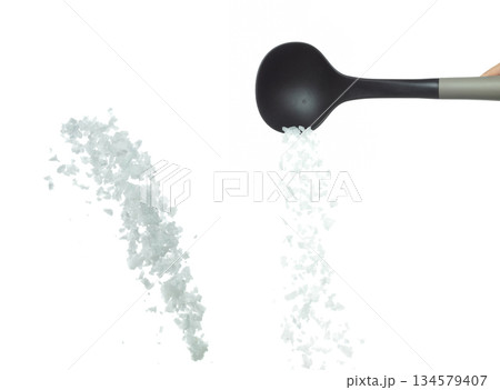 Salt rock flower pour fall in ladle, white Salt rock flower cook abstract cloud fly. Big size ground salt splash in air, food object element design. White background isolated high speed freeze motion Salt rock flower pour fall in ladle, white Salt rock flower cook abstract cloud fly. Big size ground salt splash in air, food object element design. White background isolated high speed freeze motion 134579407
