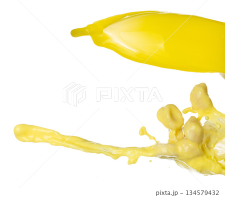 Banana juice flying fall down, yellow banana chopped slice juice wave explode. Yellow paint color splash throwing in Air. White background Isolated high speed shutter, throwing freeze stop motion Banana juice flying fall down, yellow banana chopped slice juice wave explode. Yellow paint color splash throwing in Air. White background Isolated high speed shutter, throwing freeze stop motion 134579432