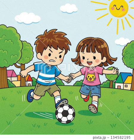 草原でサッカーをする子供たち 134582195