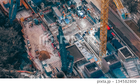 Dec 20 2025 Construction Site With Cranes, Builders, And Materials 134582800