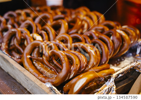 Traditional Fresh Baked German Pretzels with Salt in a Basket 134587590