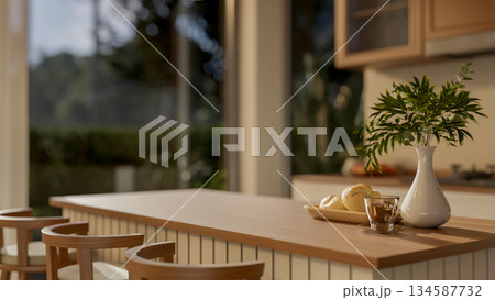 Close up a glass of coffee and breads on plate and with vase on wooden counter with chair in kitchen 134587732