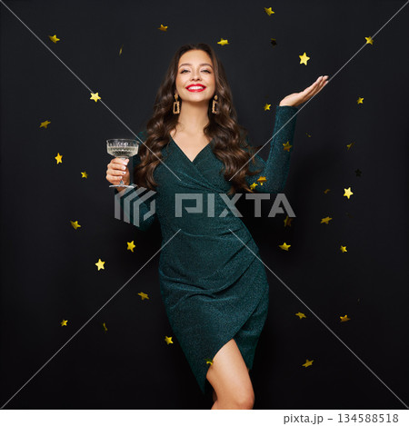 Beautiful woman with glass of champagne 134588518