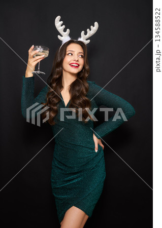 Beautiful woman with glass of champagne 134588522