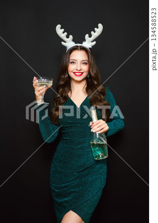 Beautiful woman with glass of champagne 134588523