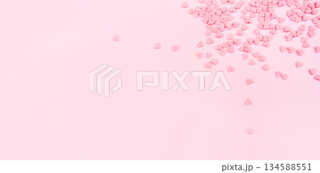 Pink background with tiny hearts. Valentine's day concept. Top view. 134588551