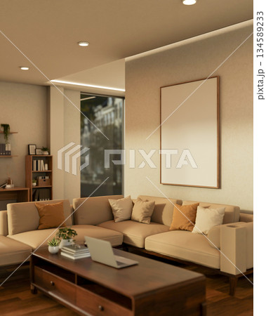 Blank frame on white wall of a living room hanging over a sofa set on parquet floor and wooden table 134589233