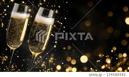Sparkling champagne flutes with festive bokeh background for holiday celebration concept Sparkling champagne flutes with festive bokeh background for holiday celebration concept 134589342