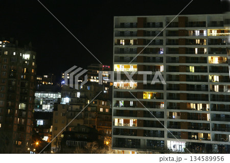 Christmas decorations on the balcony of a multi-story building in Tbilisi (they twinkle) 134589956