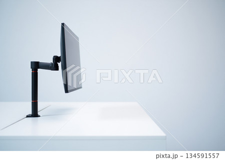 studio shot of light bulb on white desk 134591557