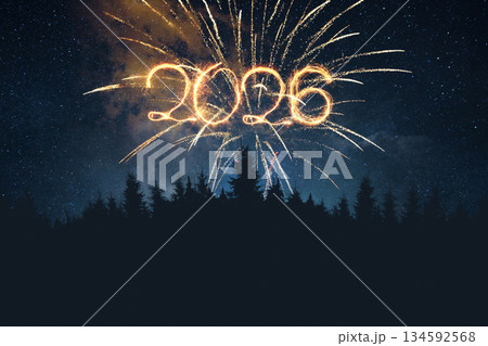 Happy New Year 2026. Spectacular golden fireworks display forming the numbers 2026 against a deep blue starry sky. Ideal for seasonal greetings, holiday promotions, celebration. Happy New Year 2026. Spectacular golden fireworks display forming the numbers 2026 against a deep blue starry sky. Ideal for seasonal greetings, holiday promotions, celebration. 134592568