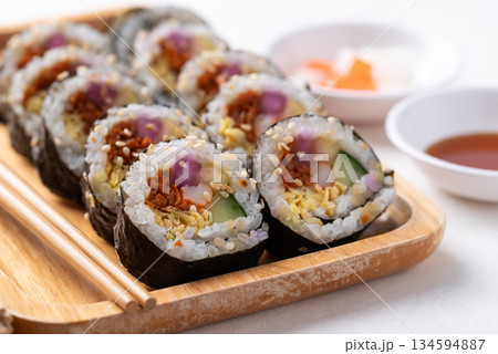 Kimbap, Korean food made from cooked rice with vegetables, egg and wrapped with dried seaweed 134594887