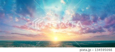 Panorama of the countryside with beautiful colorful evening sky during sunset. View from above 134595098