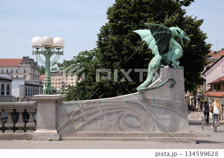 Dragon - symbol of the Slovenian capital on the Dragon Bridge in Ljubljana, Slovenia Dragon - symbol of the Slovenian capital on the Dragon Bridge in Ljubljana, Slovenia 134599628