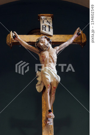 Crucifix in Saint Catherine of Alexandria church in Ribnicki Kunic, Croatia Crucifix in Saint Catherine of Alexandria church in Ribnicki Kunic, Croatia 134602549