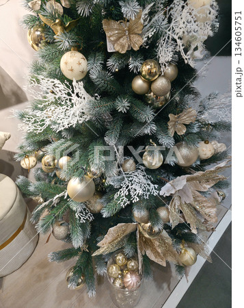 Cozy Flocked Christmas Tree and Gnome in Stylish Livingroom Cozy Flocked Christmas Tree and Gnome in Stylish Livingroom 134605751