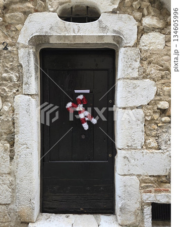Old door detail in saint paul de vence Medieval village in provence france in xmas season Old door detail in saint paul de vence Medieval village in provence france in xmas season 134605996