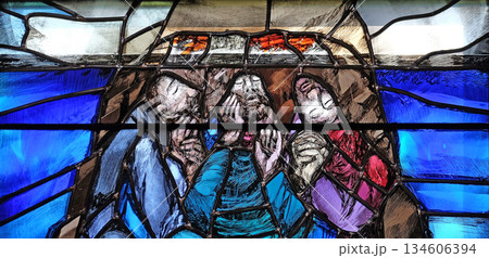 God begins salvation in this world through His Son Jesus Christ, detail of stained glass window by Sieger Koder in St. John church in Piflas, Germany God begins salvation in this world through His Son Jesus Christ, detail of stained glass window by Sieger Koder in St. John church in Piflas, Germany 134606394