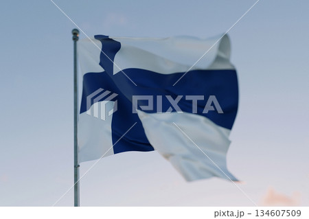 National flag of Finland waving in the wind against a clear sky, symbolizing patriotism, independence, national pride, and unity. Freedom, creative. Travel, concept National flag of Finland waving in the wind against a clear sky, symbolizing patriotism, independence, national pride, and unity. Freedom, creative. Travel, concept 134607509