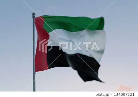 National flag of UAE waving in the wind against a clear sky, symbolizing patriotism, independence, national pride, and unity.  Freedom, creative. Travel United Arab Emirates, concept 134607521