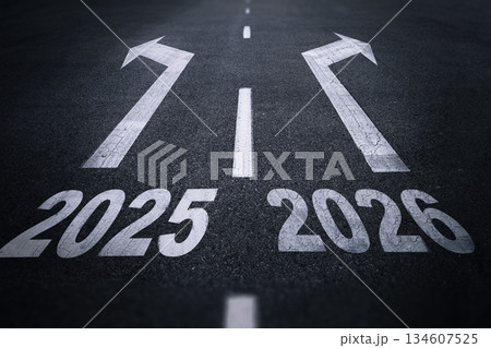 Road markings with arrows and years 2025 and 2026, symbolizing future direction, choice, planning, and decision-making for the upcoming years. Road markings with arrows and years 2025 and 2026, symbolizing future direction, choice, planning, and decision-making for the upcoming years. 134607525