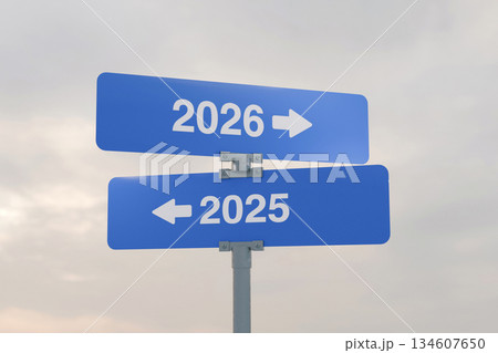 Road signs indicate the path to the new year 2026 and the old year 2025 on a gray sky, creative idea. Choose a new road, concept. Change for the better 134607650