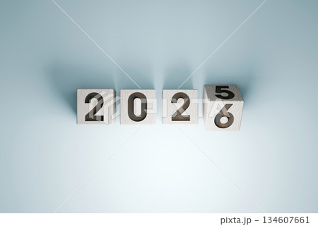 Wooden blocks showing the transition from 2025 to 2026, symbolizing the New Year, change, and fresh beginnings on a light background. 2026 top view, creative idea. 2025 turns into 2026, concept Wooden blocks showing the transition from 2025 to 2026, symbolizing the New Year, change, and fresh beginnings on a light background. 2026 top view, creative idea. 2025 turns into 2026, concept 134607661