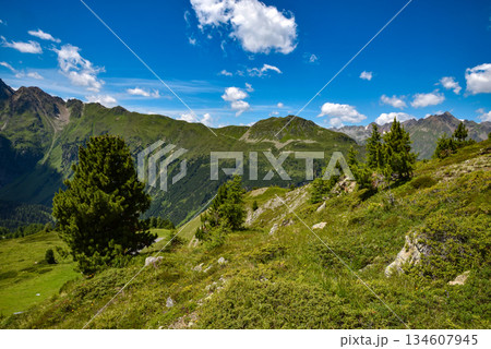 Rocky peaks in the Tirol Alps. Scenic mountain landscape with blue sky with clouds. Austria. Europe 134607945