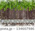 Christmas or New Year greeting card. Branches of spruce and ribbon with snowflakes and golden star 134607986
