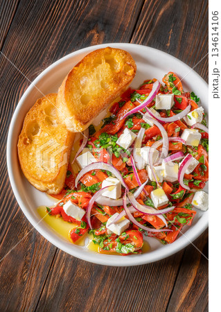 Roasted red pepper salad with feta red onion herbs and toasted crostini Roasted red pepper salad with feta red onion herbs and toasted crostini 134614106