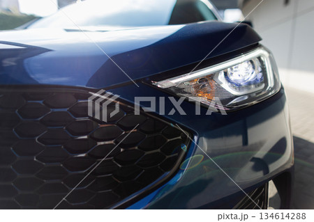 Front view of modern compact SUV with chrome grille and clean polished design. Front view of modern compact SUV with chrome grille and clean polished design. 134614288