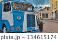 Porvoo, Finland - December 08, 2020: Blue Citroen food truck is parked on a cobblestone street, surrounded by quaint buildings, creating a vibrant and inviting atmosphere 134615174
