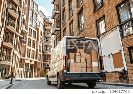Modern Urban Street Scene Featuring Large Delivery Truck in City Residential Area 134617709