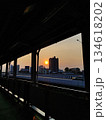 Vibrant sunset over city skyline and highway with architectural silhouette 134618202