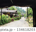 Scenic view of a peaceful mountain village from a vehicle window 134618203