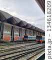 Busy train station with diesel trains in Thailand 134618209