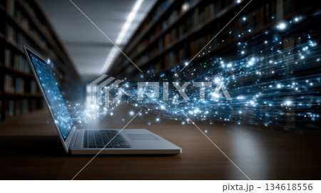A portable computer screen displays bright blue digital information flowing across a desk into a library. This symbolizes online education, virtual learning, convenient access to electronic materials. 134618556