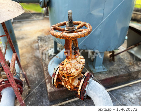 Geothermal power plant equipment with control valve and steam pipeline, representing renewable energy, sustainable electricity generation, clean technology, and eco friendly industrial infrastructure 134620372