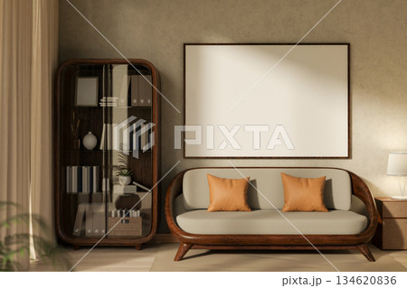 Empty blank frame hanging over a wooden sofa or armchair next to glass door cabinet in living room. 134620836