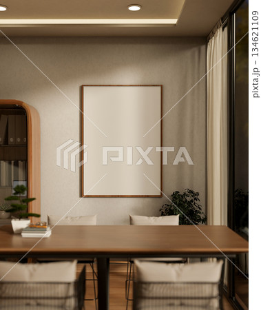 Blank frame on wall aside cabinet and wooden table with bonsai pot and books in living room or cafe. Blank frame on wall aside cabinet and wooden table with bonsai pot and books in living room or cafe. 134621109