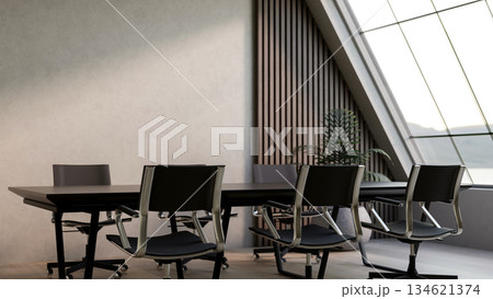 Black long table and swivel chairs with sloped roof window in a meeting room in office or company. 134621374