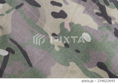 Armed force multicam camouflage fabric texture piece background close up 134622643