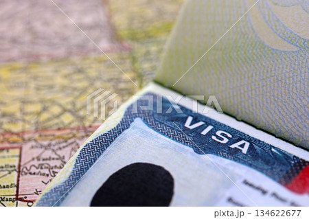 Visa to the USA and a trip to United States. Visa sign with background of United States map close up 134622677