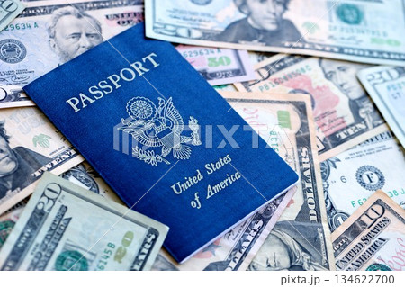 US passport with USA dollars money bills, American citizen in United States of America concept 134622700
