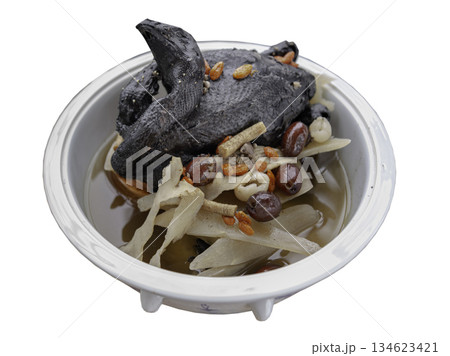 A black chicken soup or silkie chicken soup isolated on White background with clipping path. A black chicken soup or silkie chicken soup isolated on White background with clipping path. 134623421